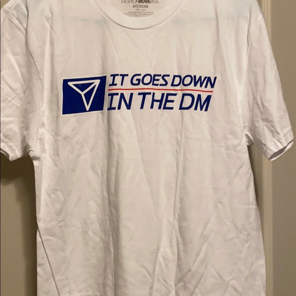 White graphics tee...It Goes Down in The DM...